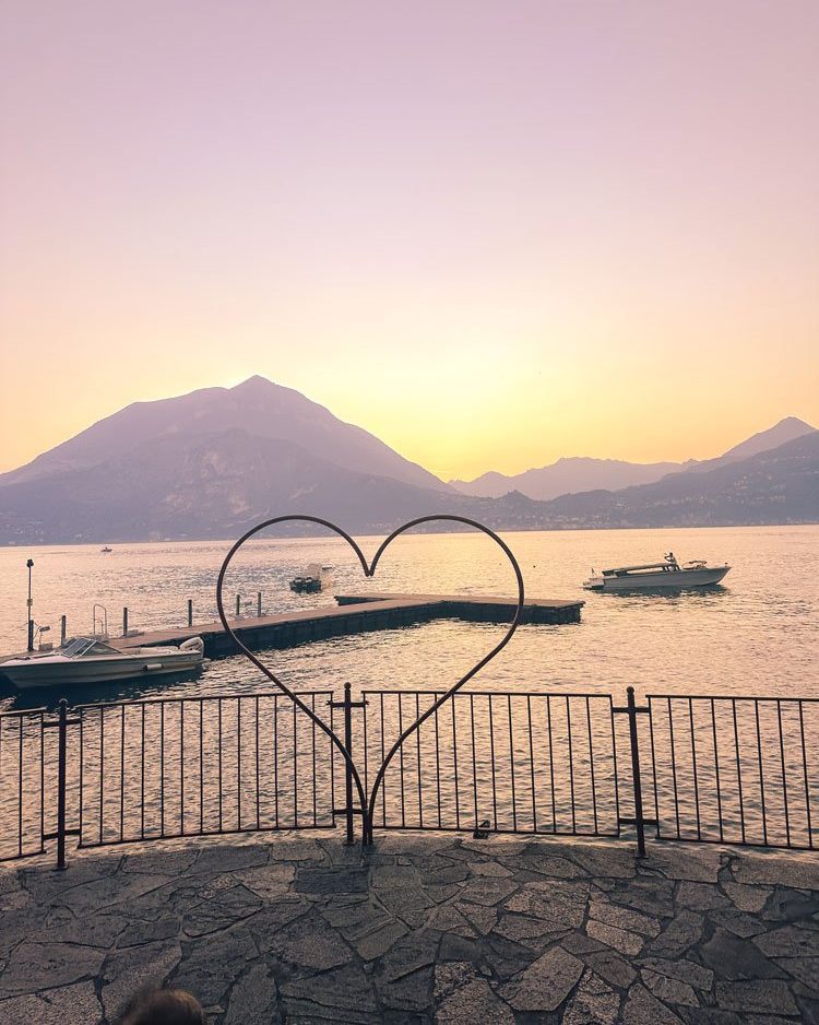 30 Best Instagram Spots In Lake Como 26 sunset and heart sign with Lake Como views
