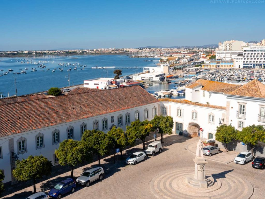 34 Incredible Weekend Trips From Barcelona 40 Beautiful white buildings with red roofs overlooking the ocean in Faro